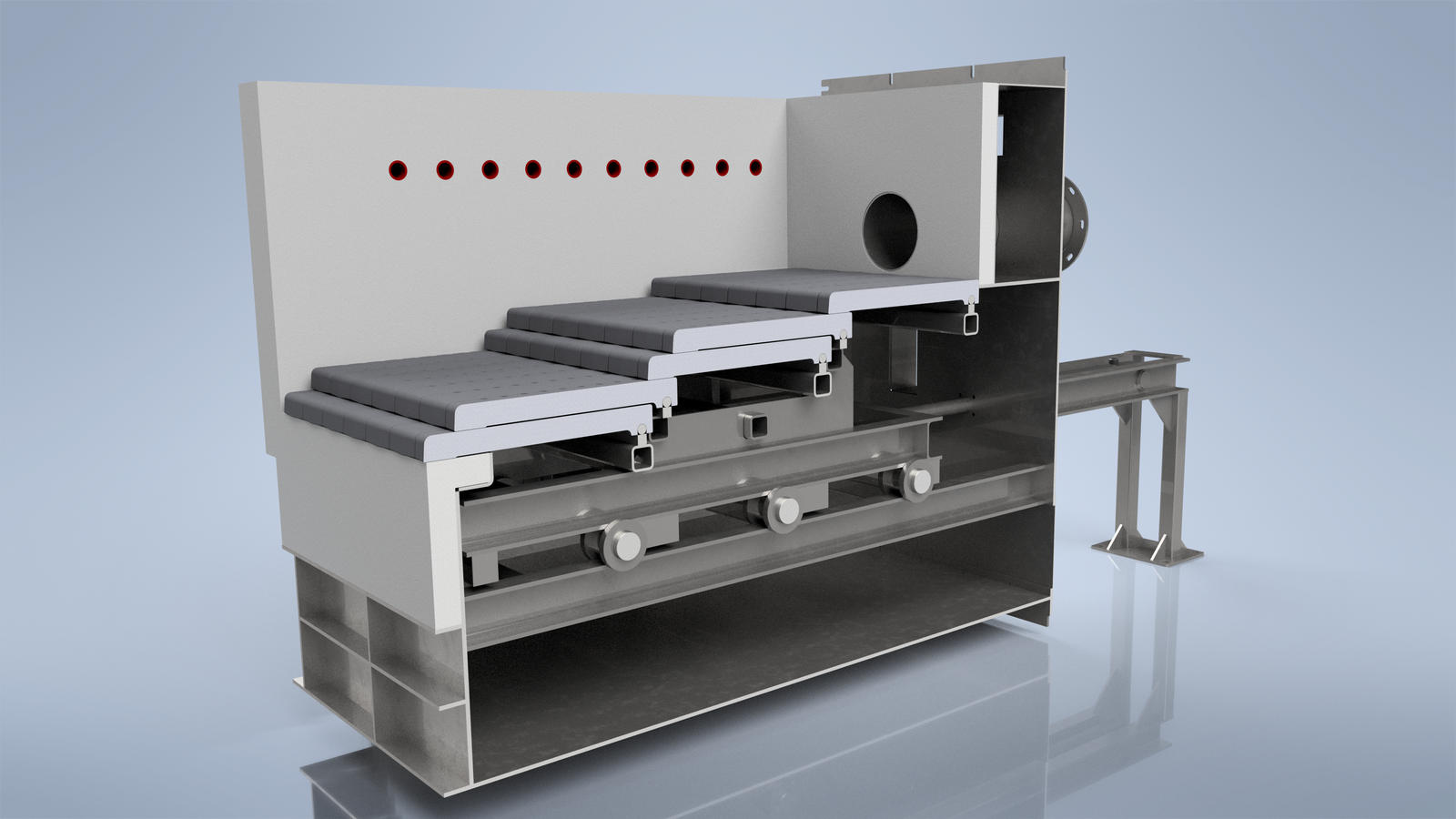 Cutaway render of a Ranheat M17 step grate retort revealing the reciprocating carriage and roller mechanism beneath the grate bars