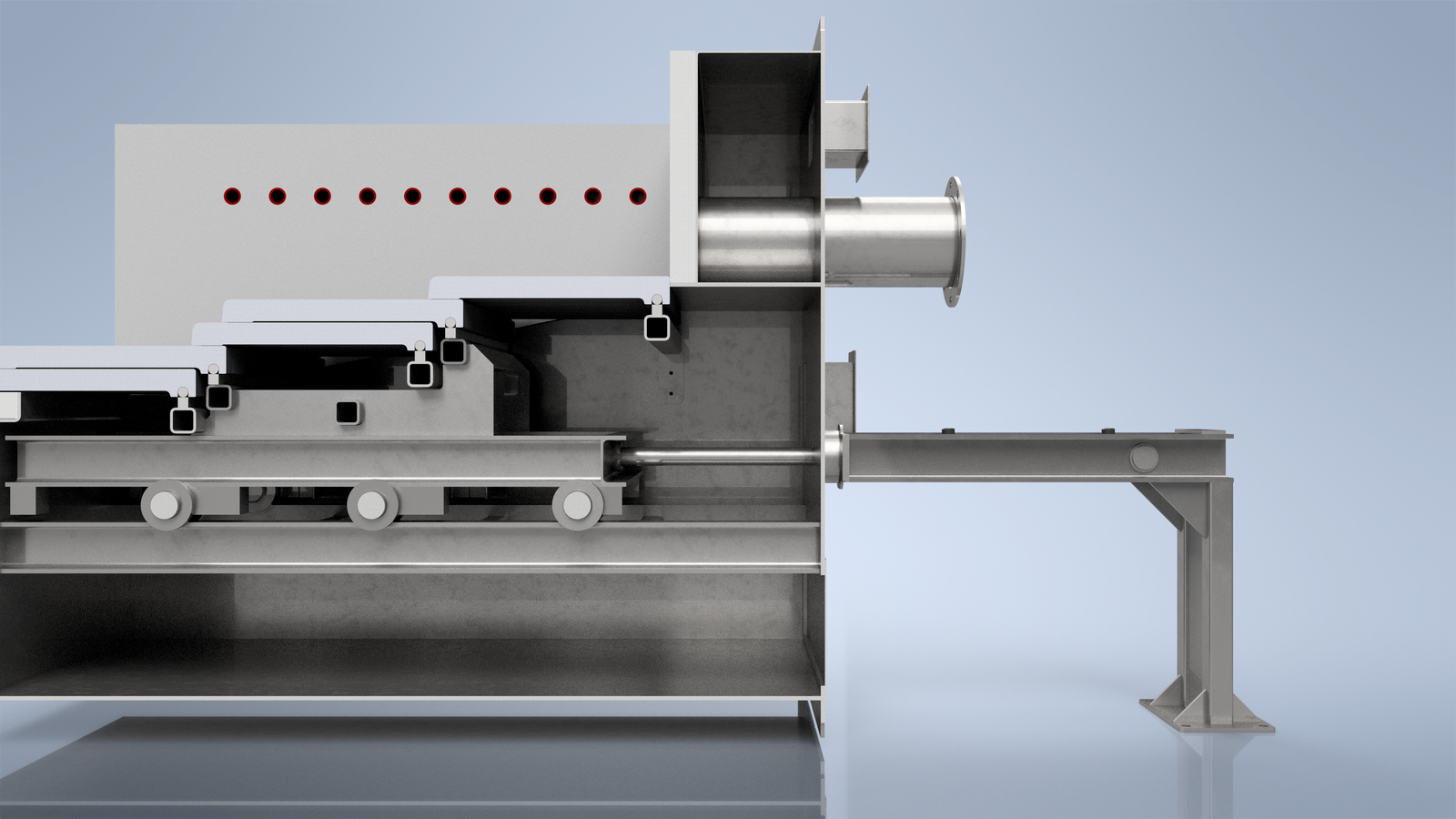 Side-on render of a Ranheat M17 reciprocating step grate retort with the hydraulic feed ram and support leg in focus